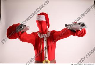 JOEL_ADAMSON CHRISTMAS VILLAIN WITH TWO GUNS